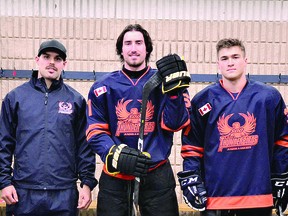 Soo Thunderbirds assistant coach Aidan Wright with forwards Caleb Wood (middle) and Parker Morgan. ALLANA PLAUNT