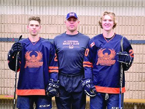 Avery Rebek (left) and Cooper Smyl (right) are two of the 12 local products who have signed with the Soo Thunderbirds of the Northern Ontario Jr. Hockey League. Pictured with Rebek and Smyl is Thunderbirds assistant coach Jeremy Stevenson. ALLANA PLAUNT