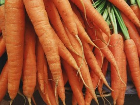 When storing carrots in the refrigerator, place them in plastic bags with holes cut in them.