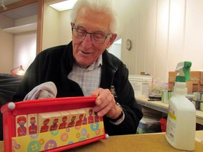 Long-time Christmas Cheer volunteer Stan Black spruces up a used toy at the charity's depot during the 2019 campaign. This year, no used items will be accepted. JEFFREY OUGLER/THE SAULT STAR/POSTMEDIA NETWORK