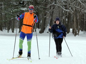 Scott McCron and Emma Good wrap up a cross-country ski on the Kinsmen Trail at Hiawatha Highlands. Officials are working to create conditions that allow for both ample activity and respect for COVID restrictions. Jeffrey Ougler