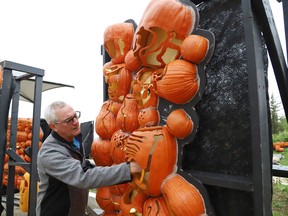 Staff scientist Dan Chaput puts the finishing touches on the PumpkInferno outdoor Halloween spooktacular adventure at Dynamic Earth in Sudbury, Ont. Halloween 2020 at Dynamic Earth runs from Oct. 2-30, on Friday, Saturday and Sunday from 7 p.m. to 11 p.m. Masks are required and tickets for the event can be purchased online at www.sciencenorth.ca/halloween.