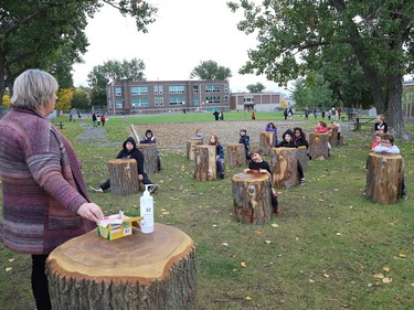 Meredith Coulas and her French immersion students show off an outdoor classroom at Lansdowne Public School in Sudbury, Ont. on Thursday October 1, 2020. The schoolyard at Lansdowne is being used as an alternate place of learning for students as part of a revitalization plan at the school, and because of the COVID-19 pandemic. John Lappa/Sudbury Star/Postmedia Network