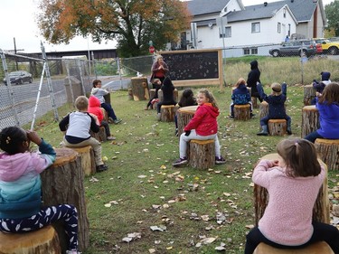 Meredith Coulas and her French immersion students show off an outdoor classroom at Lansdowne Public School in Sudbury, Ont. on Thursday October 1, 2020. The schoolyard at Lansdowne is being used as an alternate place of learning for students as part of a revitalization plan at the school, and because of the COVID-19 pandemic. John Lappa/Sudbury Star/Postmedia Network