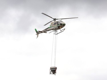 ValeÕs annual aerial seeding program wrapped up on Friday October 2, 2020, near the town of Wahnapitae. Helicopters from Zimmer Air Services applied fertilizer, grass seed and lime over a four-day period. Pioneer Construction provided the staging site for the project. The aerial seeding program targets barren land requiring reclamation around the companyÕs operations. The program, which started in 1990, has treated more than 3,900 hectares (9,650 acres) of land to date. This yearÕs treatment area was about 100 hectares (247 acres). Starting this weekend, Zimmer helicopters will apply lime to an area about one kilometre north of Vale's Copper Cliff central tailings area. John Lappa/Sudbury Star/Postmedia Network