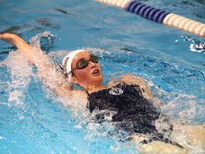 Noemie Ringuette, of Laurentian University Voyageurs swim team, trains in the pool at the Howard Armstrong Recreation Centre in Hanmer, Ont. on Tuesday October 6, 2020.