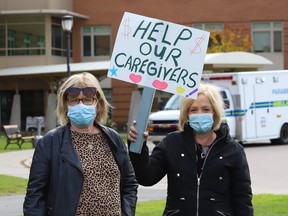 A protest was held outside the grounds of Pioneer Manor in October of last year to pressure the Ontario government to address the crisis in long-term care in the province.