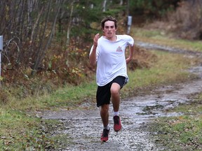 Kyle Gouchie, of Bishop Alexander Carter Catholic Secondary School, competes in a five kilometre run at the Naughton trails in Naughton, Ont. on Wednesday October 21, 2020. John Lappa/Sudbury Star/Postmedia Network