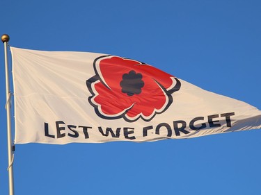 A massive Remembrance Day flag featuring a poppy and Lest We Forget, was raised to show support for veterans and current serving members of the Canadian Armed Forces at a ceremony in Sudbury, Ont. on Friday October 30, 2020. "The intent of this initiative is to bring awareness to the Poppy Campaign. Many people are unaware that the national launch is always the last Friday in October," said Daryl Adams, a veteran and co-founder of RufDiamond Ltd. The flag is located in New Sudbury behind the MIC restaurant. The event was supported by Lopes, Coniston Industrial Park and IAMGOLD Corporation. John Lappa/Sudbury Star/Postmedia Network