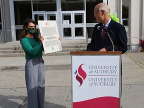 On Sept. 25, in collaboration with l'ACFO du grand Sudbury, a Franco-Ontarian flag-raising was again held at the University of Sudbury – the original location – with a crowd participating virtually via a live broadcast. This 2020 edition had some particularities. Not only was the format virtual this year, due to the pandemic, but a special announcement was made. On this 45th anniversary of the very first Franco-Ontarian flag-raising, the University of Sudbury honored the committee that put forward this important symbol, which was recently recognized as an official emblem of the province of Ontario. The university dedicated one of its recently renovated rooms – a room with a view of the floating flag, and that gathers a variety of people – to the group of individuals that achieved a unifying dream and that played an important role in the Franco-Ontarian story.  Janik Guy and Father John Meehan, president and vice-chancellor of the University of Sudbury, took part in the event. Supplied photo