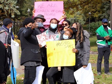 Members of the Nigerian community in Greater Sudbury and their supporters gathered in Memorial Park in Sudbury, Ontario on Saturday, October 17, 2020, for an End SARS, or #ENDSARS event, calling for the Nigerian government to end the deployment of the Special Anti-Robbery Squad, or SARS, a unit of the Nigerian Police Force and a controversial division known for police oppression and brutality. Nigerians have shared stories and video evidence of how SARS members have engaged in kidnapping, murder, theft, rape, torture, unlawful arrests, humiliation, unlawful detention, extrajudicial killings, and extortion. Protests in Nigeria have been violently oppressed, despite a recent announcement the Nigerian Police Force that it would dissolve SARS. Protests have spread around the world, with participants calling on the international community, including the Canadian government, to take action, and to push for sanctions against those who perpetrated the acts. For more information on Greater Sudbury's Nigerian community, visit www.facebook.com/thenigeriancommunitysudbury. Ben Leeson/The Sudbury Star/Postmedia Network