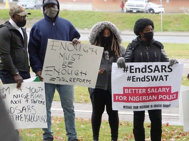 Members of the Nigerian community in Greater Sudbury and their supporters gathered in Memorial Park in Sudbury, Ontario on Saturday, October 17, 2020, for an End SARS, or #ENDSARS event, calling for the Nigerian government to end the deployment of the Special Anti-Robbery Squad, or SARS, a unit of the Nigerian Police Force and a controversial division known for police oppression and brutality. Nigerians have shared stories and video evidence of how SARS members have engaged in kidnapping, murder, theft, rape, torture, unlawful arrests, humiliation, unlawful detention, extrajudicial killings, and extortion. Protests in Nigeria have been violently oppressed, despite a recent announcement the Nigerian Police Force that it would dissolve SARS. Protests have spread around the world, with participants calling on the international community, including the Canadian government, to take action, and to push for sanctions against those who perpetrated the acts. For more information on Greater Sudbury's Nigerian community, visit www.facebook.com/thenigeriancommunitysudbury. Ben Leeson/The Sudbury Star/Postmedia Network