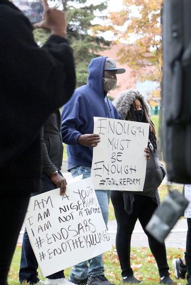 Members of the Nigerian community in Greater Sudbury and their supporters gathered in Memorial Park in Sudbury, Ontario on Saturday, October 17, 2020, for an End SARS, or #ENDSARS event, calling for the Nigerian government to end the deployment of the Special Anti-Robbery Squad, or SARS, a unit of the Nigerian Police Force and a controversial division known for police oppression and brutality. Nigerians have shared stories and video evidence of how SARS members have engaged in kidnapping, murder, theft, rape, torture, unlawful arrests, humiliation, unlawful detention, extrajudicial killings, and extortion. Protests in Nigeria have been violently oppressed, despite a recent announcement the Nigerian Police Force that it would dissolve SARS. Protests have spread around the world, with participants calling on the international community, including the Canadian government, to take action, and to push for sanctions against those who perpetrated the acts. For more information on Greater Sudbury's Nigerian community, visit www.facebook.com/thenigeriancommunitysudbury. Ben Leeson/The Sudbury Star/Postmedia Network