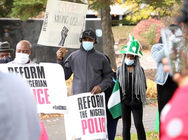 Members of the Nigerian community in Greater Sudbury and their supporters gathered in Memorial Park in Sudbury, Ontario on Saturday, October 17, 2020, for an End SARS, or #ENDSARS event, calling for the Nigerian government to end the deployment of the Special Anti-Robbery Squad, or SARS, a unit of the Nigerian Police Force and a controversial division known for police oppression and brutality. Nigerians have shared stories and video evidence of how SARS members have engaged in kidnapping, murder, theft, rape, torture, unlawful arrests, humiliation, unlawful detention, extrajudicial killings, and extortion. Protests in Nigeria have been violently oppressed, despite a recent announcement the Nigerian Police Force that it would dissolve SARS. Protests have spread around the world, with participants calling on the international community, including the Canadian government, to take action, and to push for sanctions against those who perpetrated the acts. For more information on Greater Sudbury's Nigerian community, visit www.facebook.com/thenigeriancommunitysudbury. Ben Leeson/The Sudbury Star/Postmedia Network