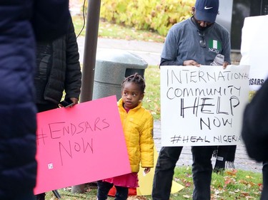 Members of the Nigerian community in Greater Sudbury and their supporters gathered in Memorial Park in Sudbury, Ontario on Saturday, October 17, 2020, for an End SARS, or #ENDSARS event, calling for the Nigerian government to end the deployment of the Special Anti-Robbery Squad, or SARS, a unit of the Nigerian Police Force and a controversial division known for police oppression and brutality. Nigerians have shared stories and video evidence of how SARS members have engaged in kidnapping, murder, theft, rape, torture, unlawful arrests, humiliation, unlawful detention, extrajudicial killings, and extortion. Protests in Nigeria have been violently oppressed, despite a recent announcement the Nigerian Police Force that it would dissolve SARS. Protests have spread around the world, with participants calling on the international community, including the Canadian government, to take action, and to push for sanctions against those who perpetrated the acts. For more information on Greater Sudbury's Nigerian community, visit www.facebook.com/thenigeriancommunitysudbury. Ben Leeson/The Sudbury Star/Postmedia Network