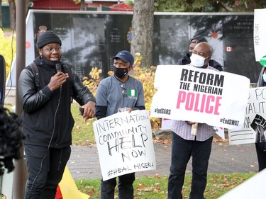 Members of the Nigerian community in Greater Sudbury and their supporters gathered in Memorial Park in Sudbury, Ontario on Saturday, October 17, 2020, for an End SARS, or #ENDSARS event, calling for the Nigerian government to end the deployment of the Special Anti-Robbery Squad, or SARS, a unit of the Nigerian Police Force and a controversial division known for police oppression and brutality. Nigerians have shared stories and video evidence of how SARS members have engaged in kidnapping, murder, theft, rape, torture, unlawful arrests, humiliation, unlawful detention, extrajudicial killings, and extortion. Protests in Nigeria have been violently oppressed, despite a recent announcement the Nigerian Police Force that it would dissolve SARS. Protests have spread around the world, with participants calling on the international community, including the Canadian government, to take action, and to push for sanctions against those who perpetrated the acts. For more information on Greater Sudbury's Nigerian community, visit www.facebook.com/thenigeriancommunitysudbury. Ben Leeson/The Sudbury Star/Postmedia Network