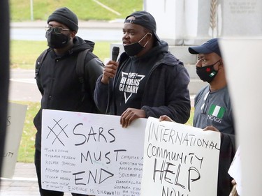 Members of the Nigerian community in Greater Sudbury and their supporters gathered in Memorial Park in Sudbury, Ontario on Saturday, October 17, 2020, for an End SARS, or #ENDSARS event, calling for the Nigerian government to end the deployment of the Special Anti-Robbery Squad, or SARS, a unit of the Nigerian Police Force and a controversial division known for police oppression and brutality. Nigerians have shared stories and video evidence of how SARS members have engaged in kidnapping, murder, theft, rape, torture, unlawful arrests, humiliation, unlawful detention, extrajudicial killings, and extortion. Protests in Nigeria have been violently oppressed, despite a recent announcement the Nigerian Police Force that it would dissolve SARS. Protests have spread around the world, with participants calling on the international community, including the Canadian government, to take action, and to push for sanctions against those who perpetrated the acts. For more information on Greater Sudbury's Nigerian community, visit www.facebook.com/thenigeriancommunitysudbury. Ben Leeson/The Sudbury Star/Postmedia Network