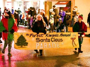 Revellers take in the 2019 Kiwanis Club of Forest Santa Claus Parade. This year, the club is teaming up with the Forest Agricultural Society to host a stationary and safe Santa Claus parade at the Forest Fairgrounds. Handout/Sarnia This Week