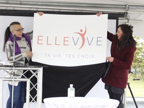 Chantal Mailloux, executive director with the Ellevive organization, left, along with the president of board of directors, Celeste Courville, unveil the new name and brand logo of their organization. Ellevive was revealed as the new name of the Centre Passerelle pour femmes du Nord de l'Ontario.

RICHA BHOSALE/The Daily Press