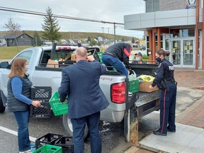 Timmins Police Service won the "good-natured" food drive competition on Friday against the Timmins Fire Department as TPS members were able to gather up a sizeable amount of non-perishable food items to support local food banks. More than 500 pounds of food was collected during the past two weeks of the campaign. As a result of winning the competition, the TPS flag will fly outside of the Timmins fire hall on Cedar Street South for the next week. 

Supplied