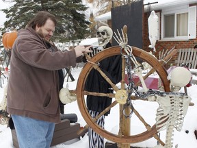 Shawn Mason is getting into the Halloween spirit as he was putting out a fancy display outside his house for Saturday. He is hoping to keep the Halloween display tradition going on Diane Crescent that was started by a neighbouring family in 2006. 

RICHA BHOSALE/The Daily Press