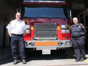 Tillsonburg Acting Deputy Chief Vanessa Devolin, on the right, with Tillsonburg Fire Chief Brad Lemaich at the Tillsonburg fire hall. (Chris Abbott/Norfolk and Tillsonburg News)