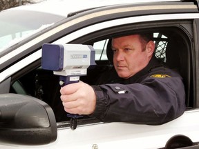 Police in Norfolk County are under increasing pressure to bring loud, reckless drivers to heel, especially in the county's increasingly-congested urban zones. Here, a member of the Norfolk OPP auxiliary demonstrates a recently-acquired radar unit. Monte Sonnenberg/Postmedia Network