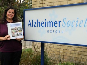 Shelley Green, the executive director of the Alzheimer Society of Oxford County, holds the newly developed guide Together Apart: A Guide to Visiting from a Distance. The manual is a new resource to more easily help friends, families and caregivers continue to virtually meet people living with dementia in the midst of the COVID-19 pandemic. (Greg Colgan/Woodstock Sentinel-Review)