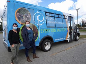 Oxford County Community Health Centre outreach worker Abbie Boesterd, left, and nurse practitioner Jennifer Stock are part of the mobile health outreach bus run by the Oxford County Community Health Centre. (Chris Abbott/Norfolk and Tillsonburg News)