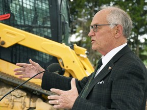 MPP Randy Pettapiece, parliamentary assistant to the minister of agriculture, food and rural affairs, announces the start of construction on a $6.5-million field crop services building on Oct. 19. Tom Morrison/Postmedia Network