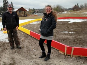 Park operators David Longe and Susan Evenden stand next to one of the two crokicurl rinks at Anicinabe Park on Tuesday, Oct. 27. The goal is to start up a crokicurl league at the park this winter.