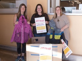 Kathy Johnson, left, Michelle Robinson, centre, and Kelly Romanchuk pose with a Koats for Kids box at IGA. Johnson and Romanchuk are the daughters of Arni Stephenson who first strated the coat collection program. Robinson is a Rotarian, the group which now runs the program.
Brigette Moore