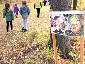 A local teacher created a story walk in Poplar Park.