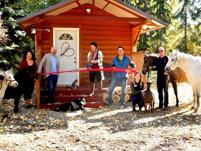 Town of Millet Councillor Vicki Pyle, Leduc-Wetaskiwin Regional Chamber of Commerce Board Members Tanis Techer and Brett Powlesland, Tammy Schamuhn, Chamber Board Member Trevor Palmer, Chamber Staff Pamela Ganske, and owner partner Allan Carruthers cut the ribbon on the new Family Counselling Services centre east of Millet Oct.2.