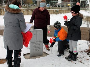 Volunteers were at the Wetaskiwin cemeteries Saturday and Sunday marking the graves of veterans with Canadian flags to help No Stone Left Alone poppy layers find the gravestones Nov. 2-7.