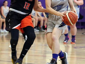 Ben Leeson/Postmedia Network

Hannah Heimonen (right) of the Superior Heights Steelhawks handles the ball while Payton Brear of the Lasalle Lancers defends during 2019 NOSSA senior girls basketball semifinal action.