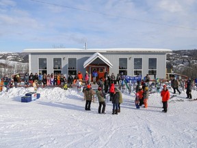 Participants in the Fairview Ski Hill Family Day fun competition lined up out side the chalet last winter, waiting to hear who the winners were.