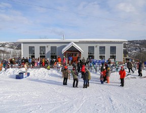 Participants in the Fairview Ski Hill Family Day fun competition lined up out side the chalet last winter, waiting to hear who the winners were.