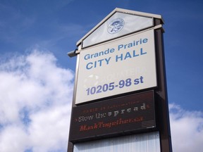 A sign before Grande Prairie city hall (10205 98 Street) in Grande Prairie, Alta. on Thursday, Sept. 3, 2020.