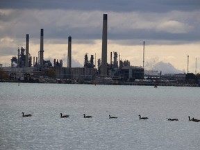 Industry smokestacks are shown from across Sarnia Bay on the St. Clair River.