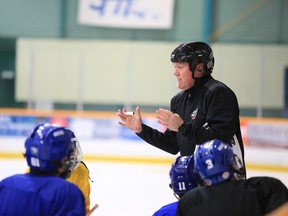 Sudbury Nickel Capital Wolves assistant coach Brian Dickinson gives his team a motivational talk during team practice in Sudbury, Ontario in this file photo. Dickinson's U18 team will begin selecting its players on Nov. 16.