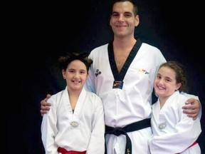 Jim Gies credits his daughters, Abby and Lily, with reigniting his passion for taekwondo. Gies will compete at the worlds this weekend — from home.