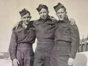 Patricia Baker’s father, Royal Canadian Army Pte. Leslie Cumming (centre), with two of his army buddies. Cumming died in 1981.