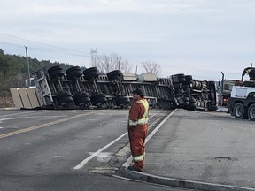 A tractor-trailer hauling lumber flipped on Highway 17 in Sudbury early Tuesday, resulting in the highway being closed for five hours.