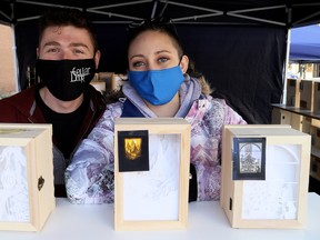 Emma Reaume (right) of Hand Crafted Shadow Boxes in Chatham sells her wares with Nick Swan at the annual All I Want For Christmas Expo at Downtown Chatham Centre on Nov. 7. Mark Malone