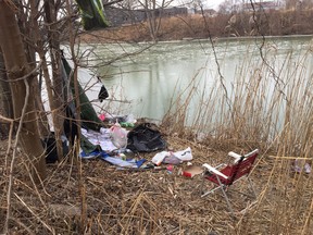 Alongside the Thames River in Chatham, blankets, a tarp and other items indicating a homeless person is spending the night outside, in this photo from early 2018. File photo/Chatham This Week