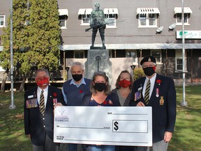 The Pembroke Business Improvement Area recently donated $900 to Pembroke Branch 72 of the Royal Canadian Legion. Half of the funds are a donation to the Poppy Fund to assist veterans and the other half to the branch to assist with ongoing expenses related to the COVID-19 pandemic. The money was raised through the PBIA’s new veterans banner program. In the photo from left, Branch 72 President Stan Halliday, Mike Powell, PBIA director, Janna Fortin, PBIA board chairwoman, Stacy Taylor, board vice-chairwoman, and Romeo Levasseur, Branch 72 poppy chairman. Anthony Dixon