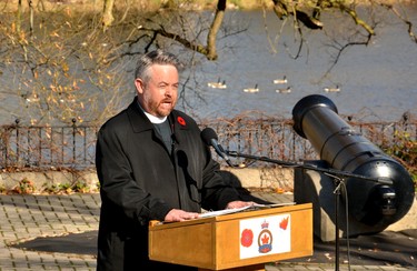St. Andrew’s Presbyterian Church Rev. Mark Wolfe delivers the Call to Remembrance at the Stratford Cenotaph Wednesday morning. Galen Simmons/The Beacon Herald/Postmedia Network