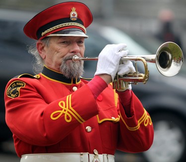 Remembrance Day service at cenotaph on Queen Street East in Sault Ste. Marie, Ont., on Wednesday, Nov. 11, 2020. David Sweet, of Royal Canadian Legion Drum and Trumpet Band, plays The Last Post. (BRIAN KELLY/THE SAULT STAR/POSTMEDIA NETWORK)