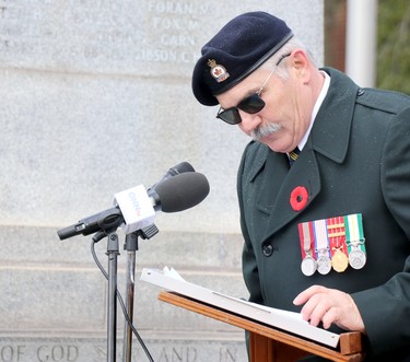 Remembrance Day service at cenotaph on Queen Street East in Sault Ste. Marie, Ont., on Wednesday, Nov. 11, 2020. Master of ceremonies Pierre Breckenridge speaks. (BRIAN KELLY/THE SAULT STAR/POSTMEDIA NETWORK)